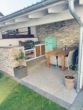 Modernes Familienhaus mit PV-Anlage, Wärmepumpe & Outdoor-Küche - überdachte Außenküche